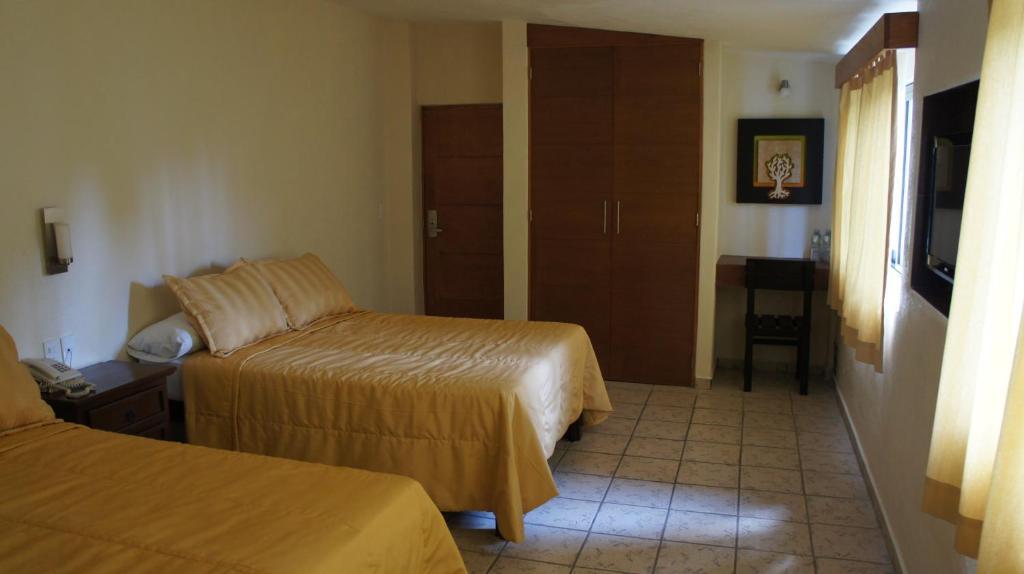Coral Pacifico Hotel Y Villas Manzanillo Habitación foto